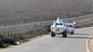 U.N. peacekeepers of UNIFIL patrol the Lebanese-Israeli border, beside Kfar Kila village in south Lebanon