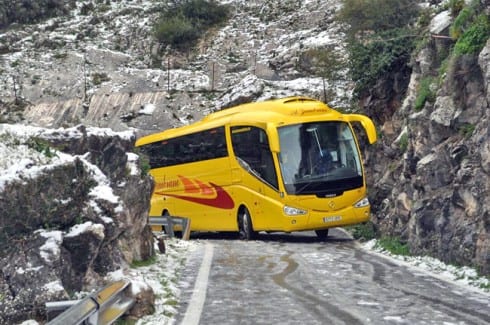 INCHES AWAY FROM DISASTER: The coach blocking the Presa de Caballeros road MA 505 at Tavizna. Photograph: Eva Bratek