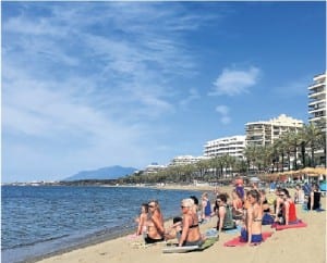 LIFE'S A BEACH: Yoga session on Marbella beach
