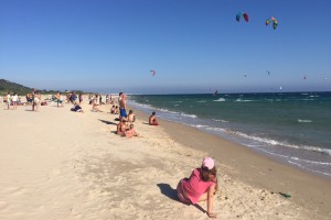Watching kitesurfers on a Tarifa beach