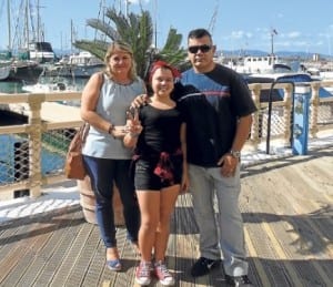 Elisha with mum Claire and dad Scott in Marina Bay