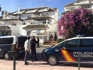 Police enter property for eviction in Marbella. Photo copyright The Olive Press