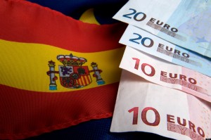 Spanish and EU flag and euro banknotes