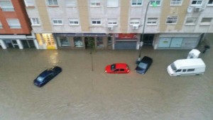 A flooded street in Malaga that was on the city's marathon route
