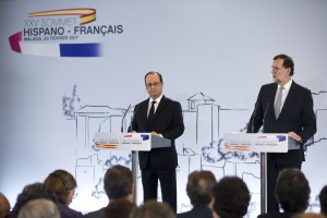 Francois Hollande and Mariano Rajoy speak at the Pompidou Centre in Malaga
