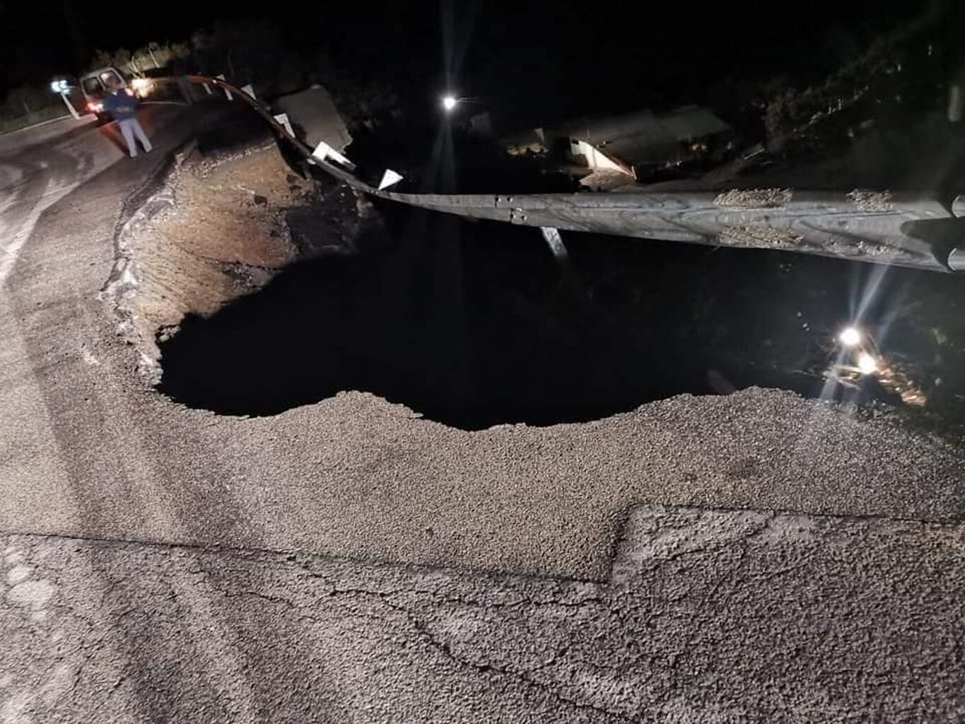 A road in Spain's Andalucia collapses due to heavy rainfall - Olive ...