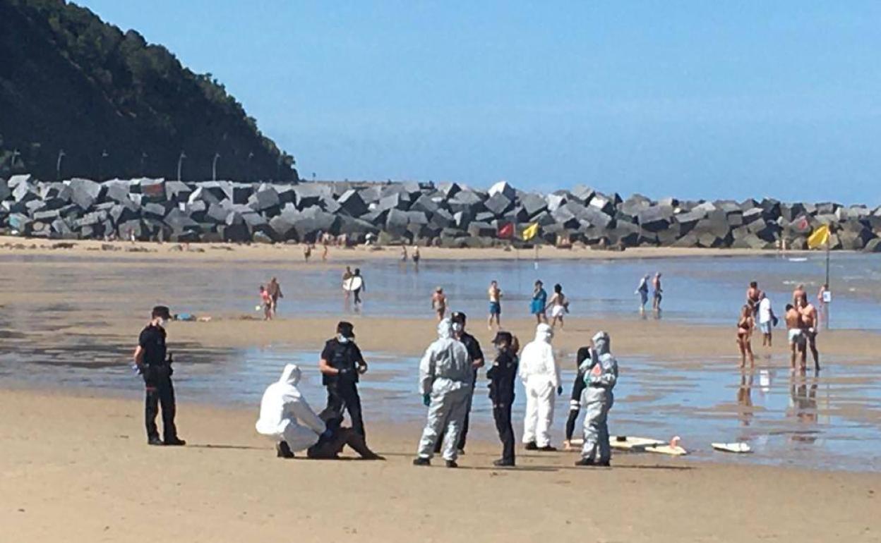 Surfer dragged off beach in Spain by men in hazmat suits after testing  positive for COVID-19 and refusing to quarantine - Olive Press News Spain