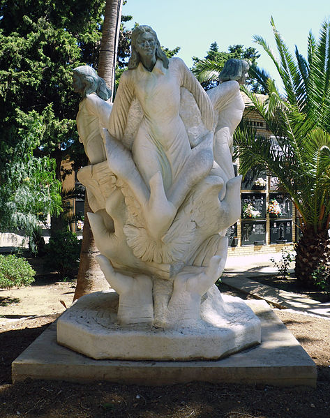 A statue to the three girls at Alcasser cemetery