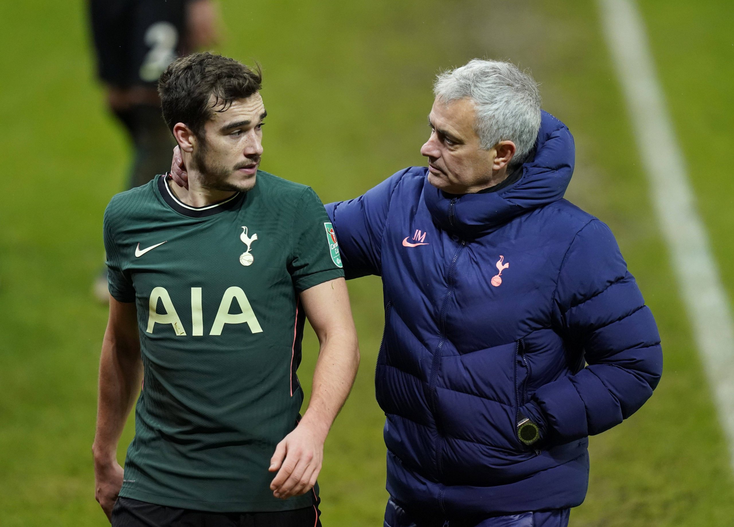 Harry Winks with Jose Mourinho during the Carabao Cup match in Stoke on December 23