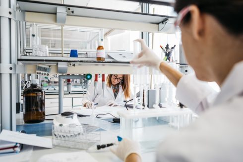 Scientists working at an Ainia laboratory