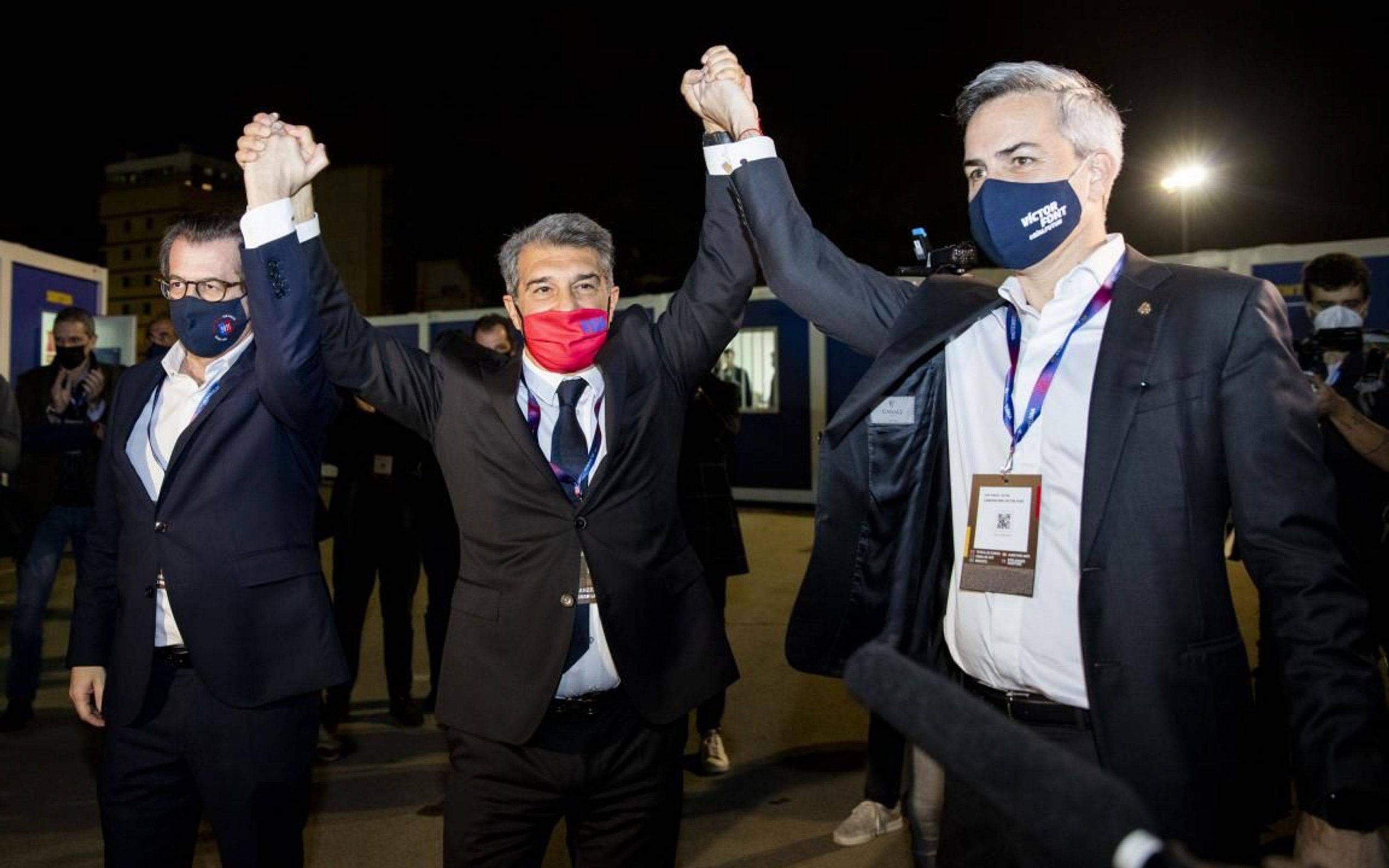 Joan Laporta (centre) with rival candidates Toni Freixa (left) and Victor Font