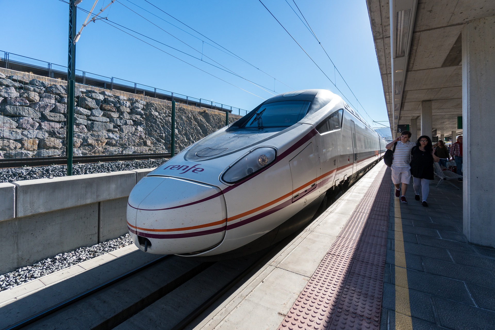 Travel chaos in Spain: Fuming passengers are ‘trapped' on stifling hot AVE train outside a station in Madrid