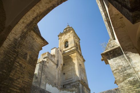 Low Angle Arch View Of Tower Of Medina Sidonia Chuch, Andalucia, Spain