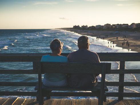 retirement elderly couple beach James Hose Unsplash