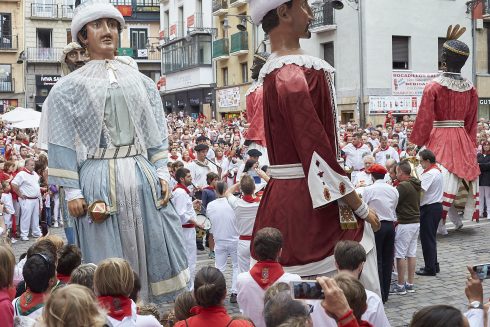 Festive Atmosphere On The Streets Of Pamplona With The Departure Of Giants Of San Fermin