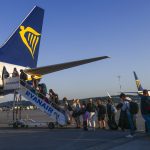 Passengers Boarding Ryanair Airplane