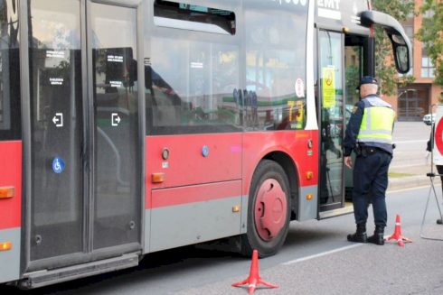 Angry passenger thumps bus driver in face and hurls him out of vehicle- just missing passing cars- in Spain's Valencia