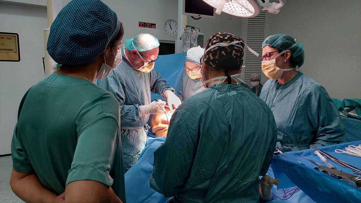 Doctors in Spain perform the world's first EVER 'perfect' reconstruction of the abdominal wall.j