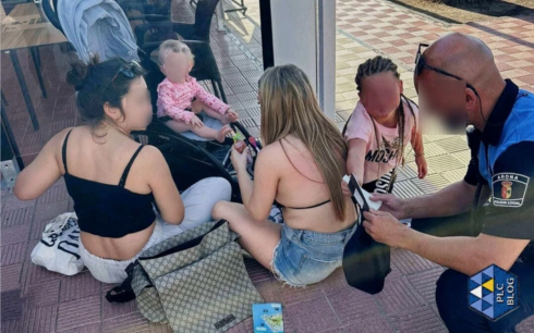 Police tend to the young girls abandoned in a car in Tenerife Credit Local police