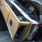 The bus is wedged in the tunnel