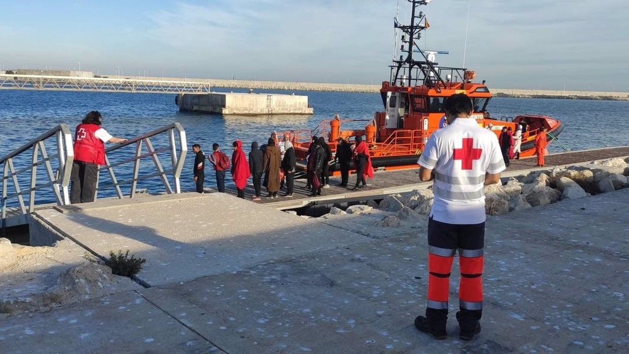 Dozens of boat migrants arrive on popular tourist beaches on Spain's Costa Blanca - including children, pregnant woman and wheelchair user