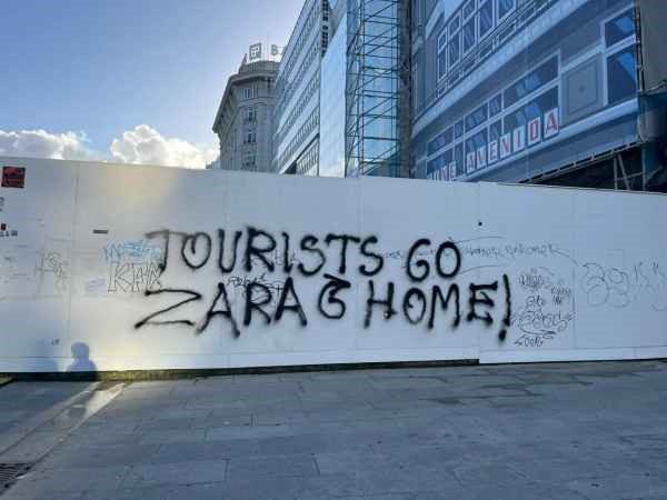 'Go to Zara and go home!' New 'anti-tourism' graffiti appears on Spain's northern coast as destination surges in popularity