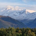 Snow falls across Spain’s mountains as cold snap sends temperatures plummeting