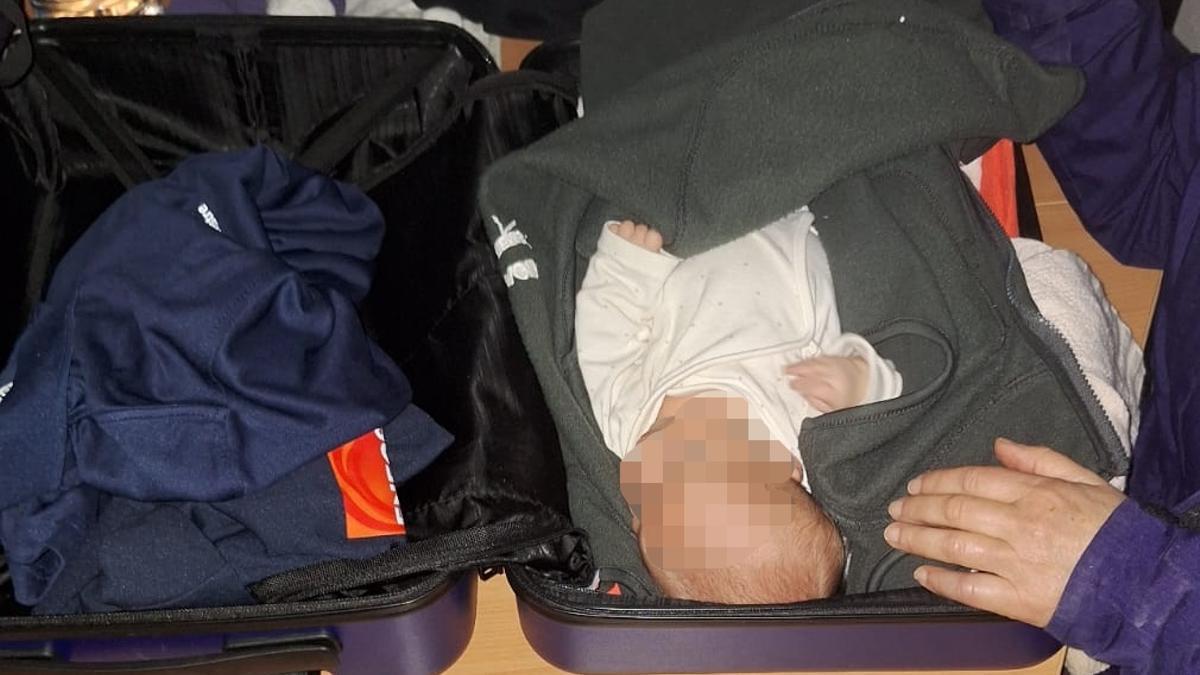 How a baby girl was rescued from inside a suitcase during deadly Valencia floods