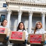 Families of Valencia flood victims present petition to Spain's politicians calling for inquiry into slow response to disaster