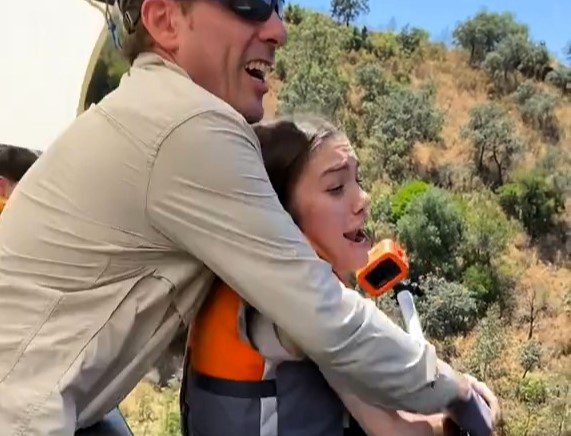 Bungee jump instructor is criticised for pushing frightened woman off a bridge in Spain