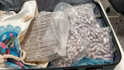 Irish passenger flying from Spain to Liverpool is caught with 18kg of drugs in his suitcase