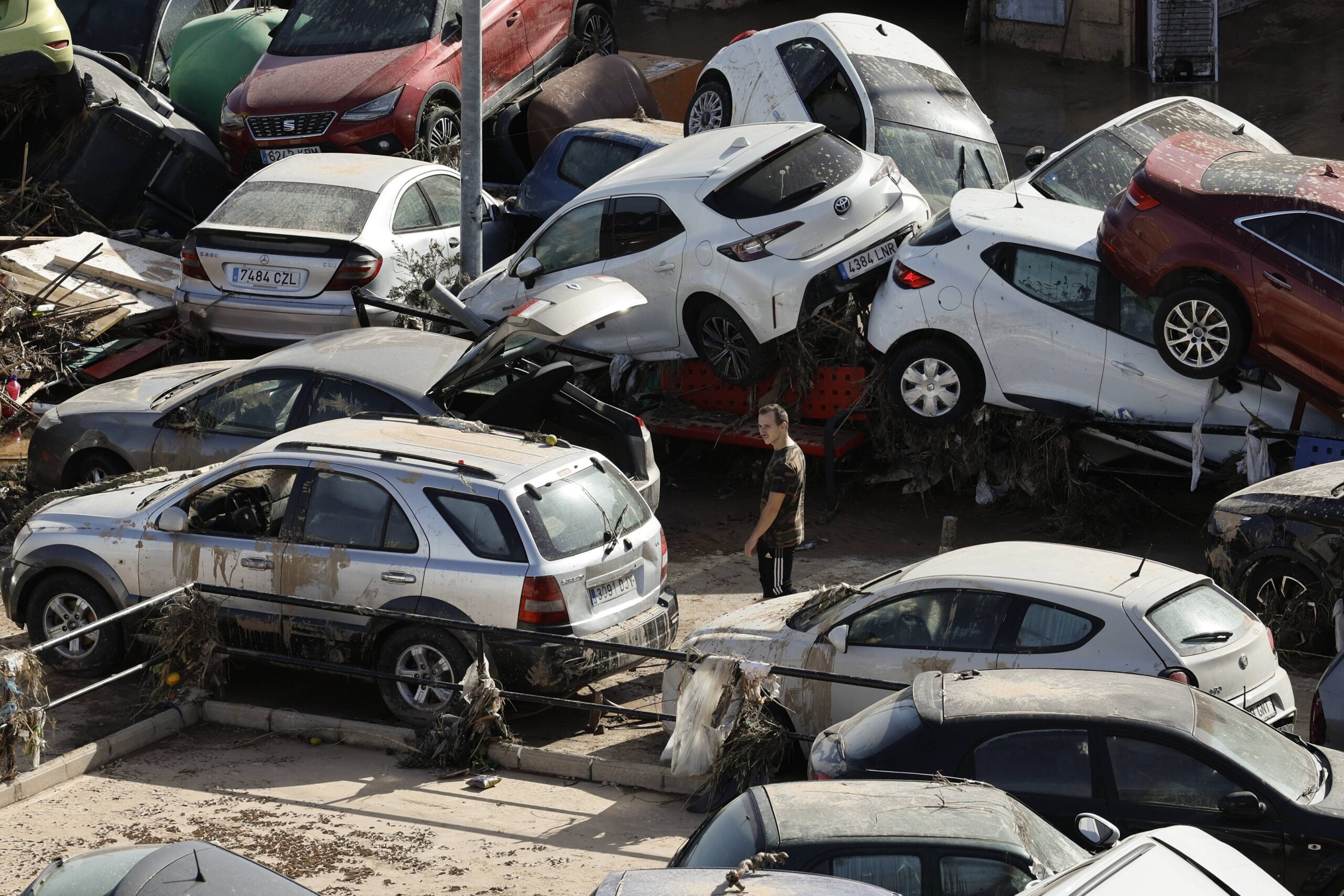 Racketeers brazenly steal over 100 cars damaged in Valencia floods- taking them on tow trucks to scrapyards in southern Spain